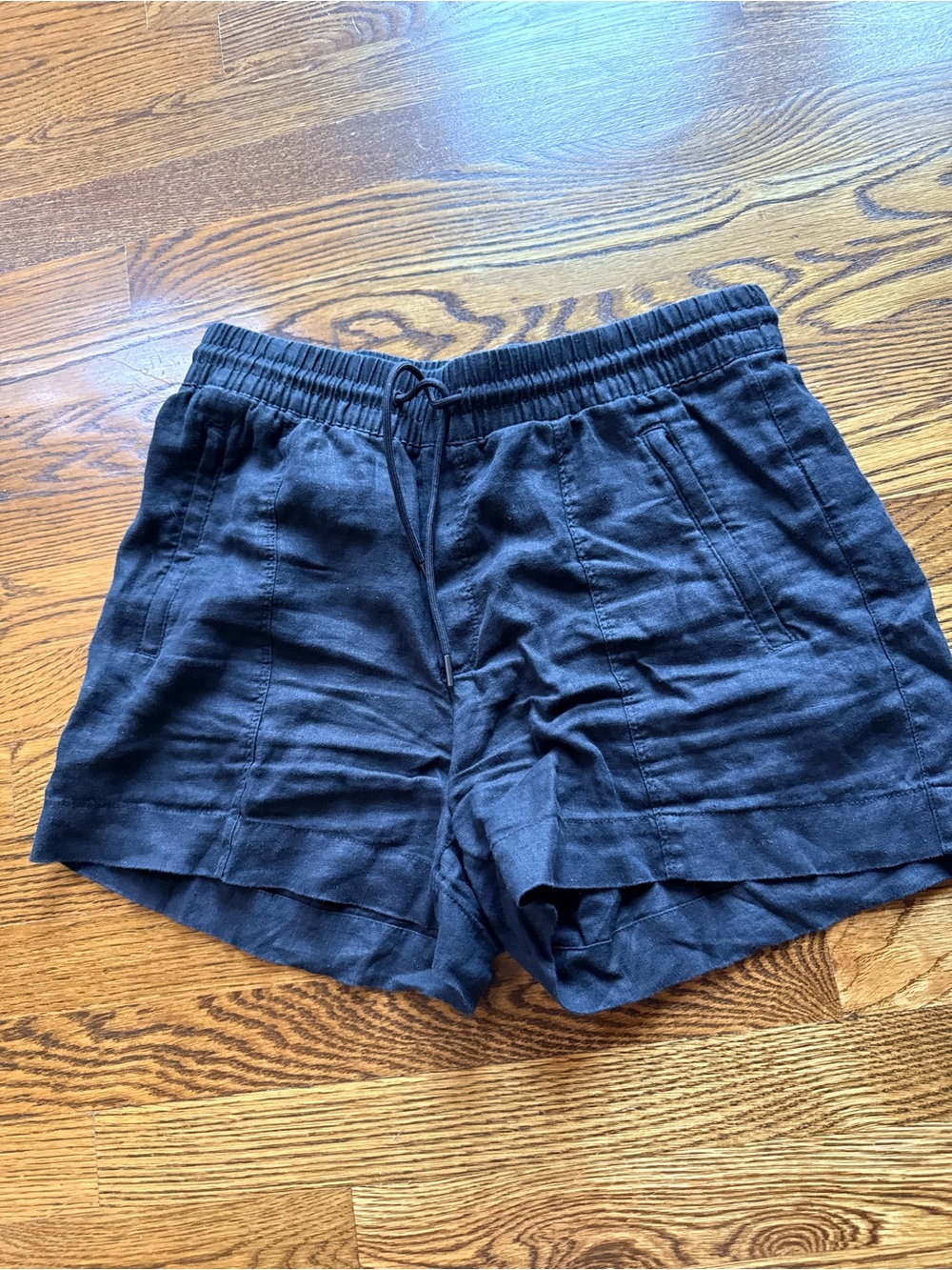 Athleta Black Linen shorts. Size S. Zip pockets. Elastic waist with tie. EUC